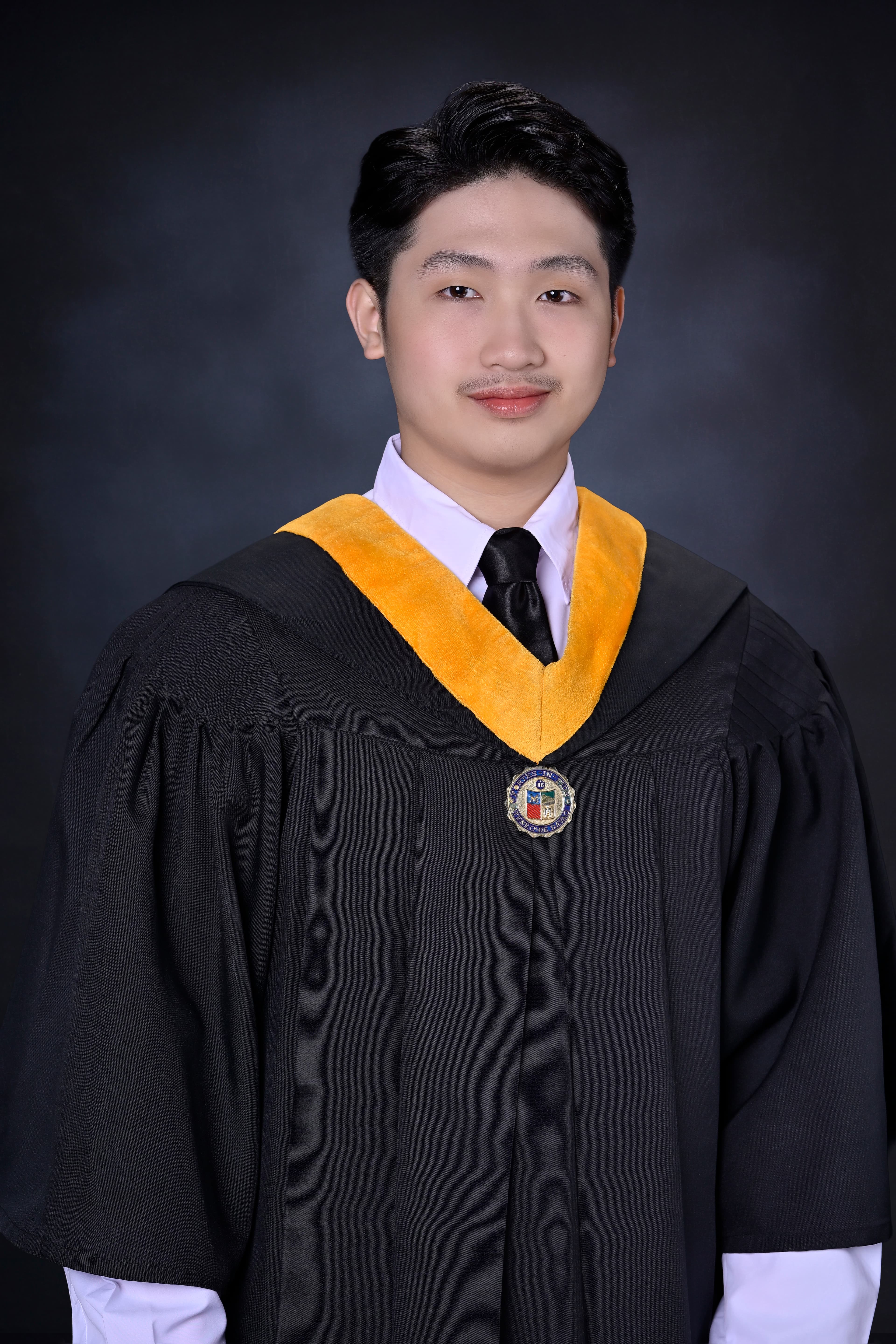 Adolfo Cedric Sarillo graduation photo